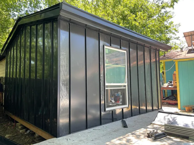 Black standing seam metal wall panels for Roof Inspection in Alamo Heights