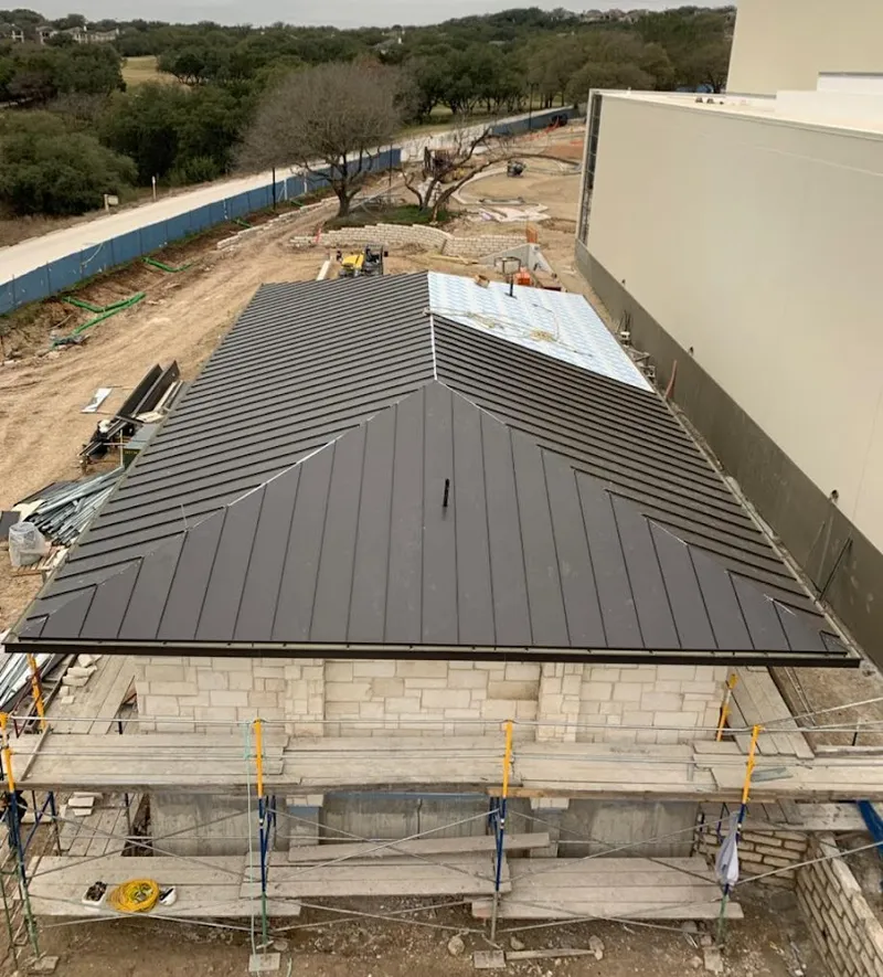Metal roof new construction with scaffolding in Alamo Heights